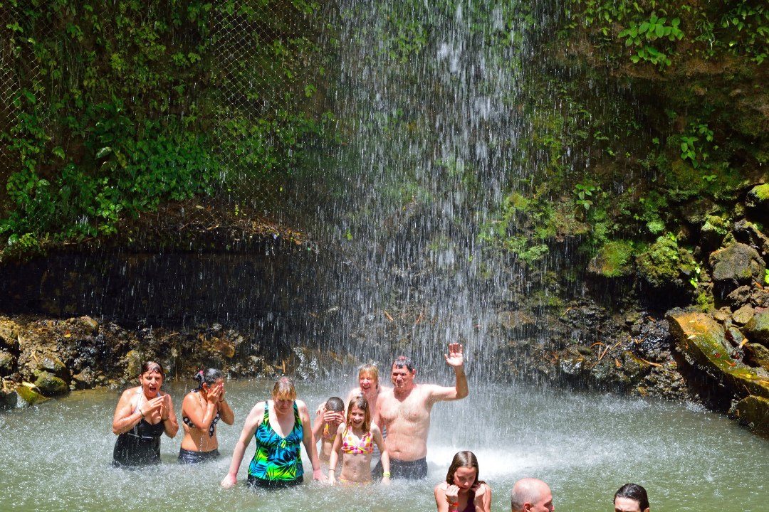 Guests at a Saint Lucia waterfall
